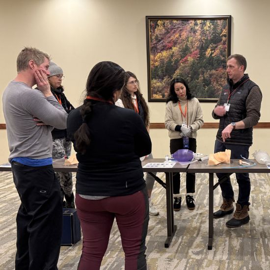 An instructor teaching an emergency airway workshop. 